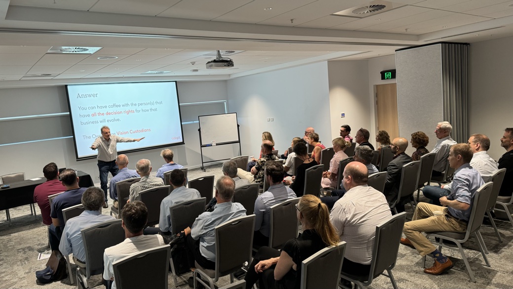 Bill Withers presenting to a room of business owners